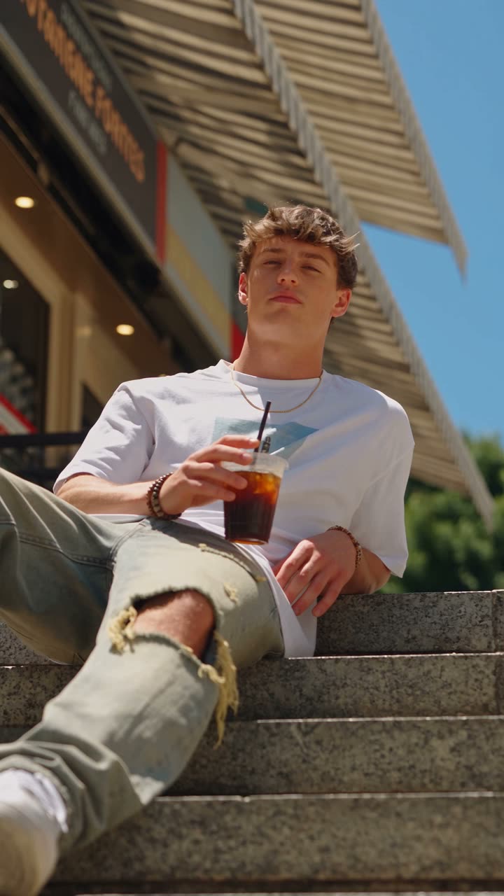 UGC-style lifestyle video of a creator with an iced drink